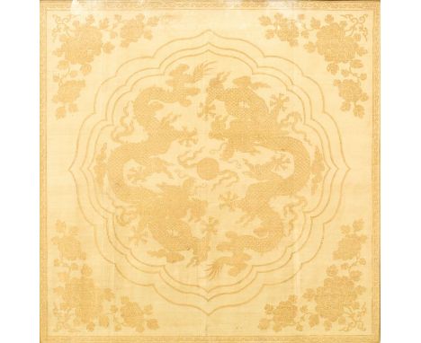 A Chinese Imperial yellow silk and gold brocade dragon panel, Qing Dynasty probably Qianlong (1735-1795), with a central brac