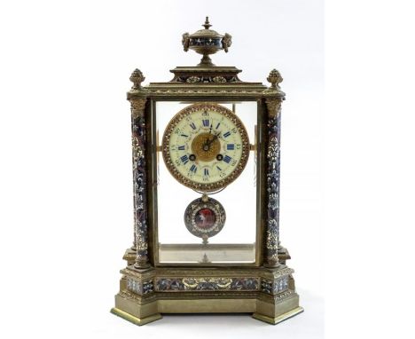 A French four glass mantel clock, with enamel portrait of what is believed to be Saint Fabiola of Rome, Italy on the pendulum