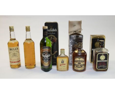 A collection of whiskey to include:1. Chivas Regal blended Scotch Whiskey 12 year old, 75cl, 1 bottle, boxed2. Auchentoshan, 