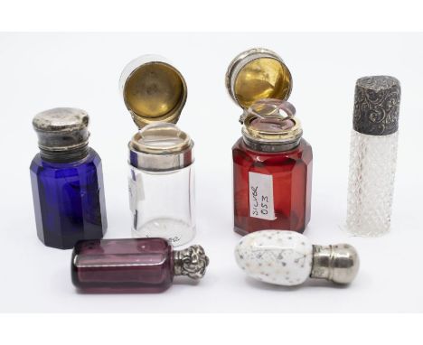 A George V silver and enamel mounted scent bottle, the cover set with cabochon amethyst above white pearl basket weave enamel