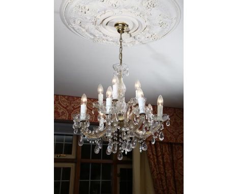 **PLEASE NOTE COLLECTION OF THIS LOT WILL BE FROM BISHTON HALL STAFFORDSHIRE**A moulded glass eight branch/twelve light elect