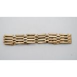 A 9 carat yellow gold Victorian articulated gate bracelet with heart padlock clasp with safety
