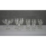 A collection of sixteen Victorian etched drinking glasses. Including a set of six vine design