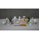 A collection of fourteen miniature replica Oriental vases with transfer design along with a