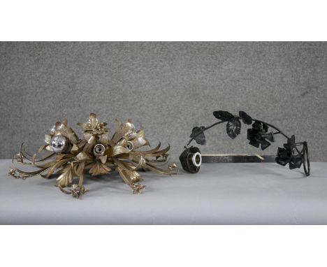 Two metal foliate and floral design lights. One black rose branch design and the other a vintage gilt metal sunburst ceiling 
