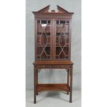 A C.1900 mahogany Chinese Chippendale style display cabinet by Edwards and Roberts with upper