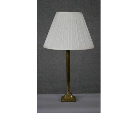 A vintage brass table lamp with pleated shade. H.62 Diam.35 cm 