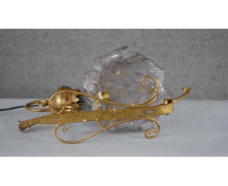 A wall mounted Murano style glass floral design light with scrolling gilt metal bracket. (damaged)  H.46 W.26cm 