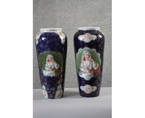 Two early 20th century transfer printed and hand gilded ceramic vases. Each one decorated with a female portrait and panels w