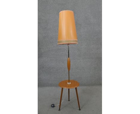 A mid century vintage standard lamp with laminated central tier on tripod dansette supports. H.147 Diam.35cm 