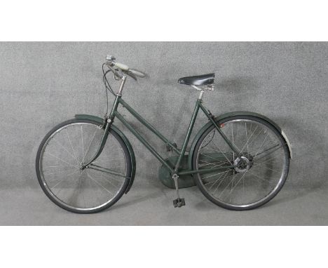 A vintage ladies Raleigh town bike. 