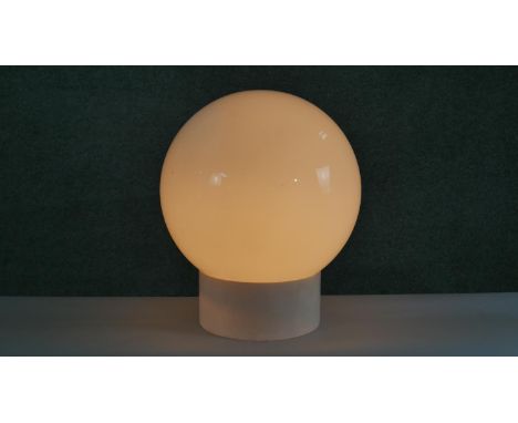 A large mid century white acrylic table lamp with opaque white glass globe shade. H.45 W.40cm 