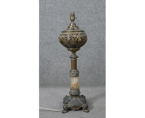 A mid century vintage brass and onyx ecclesiastical style table lamp. H.66 W.17 D.17 cm 