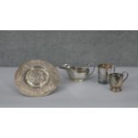 A collection of silver plate. Including an Elkington & Co repousse neoclassical design circular