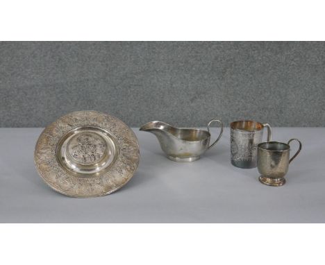 A collection of silver plate. Including an Elkington &amp; Co repousse neoclassical design circular plate inkwell along with 