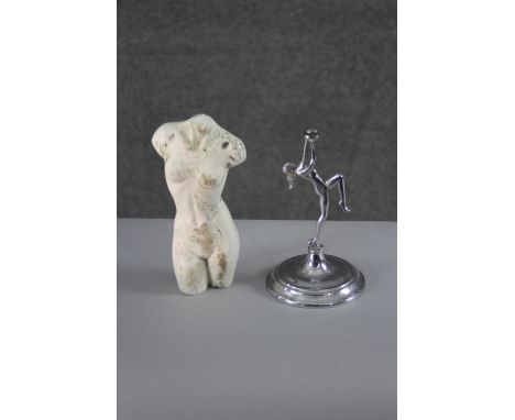 A marble effect resin torso along with a Brama chrome nude lady candlestick. H.22 W.10 cm. 