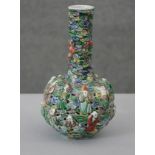 A late 19th/early 20th century Chinese Famille Verte glazed figural vase with coloured stylised