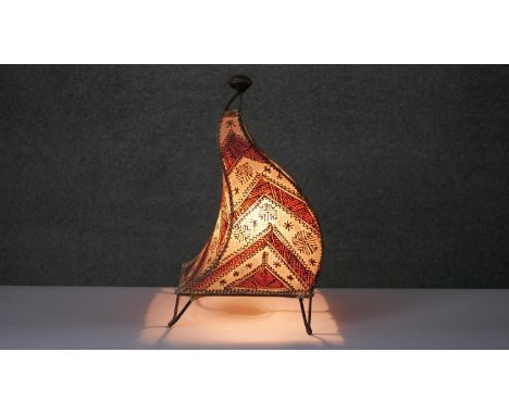 A vintage Moroccan leather and henna design pyramidal table lamp. H.45 W.26cm 