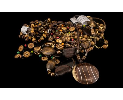 Collection of Boho/Vintage Wooden Jewellery, comprising five necklaces and one bracelet.  Short small beads, shades of brown 
