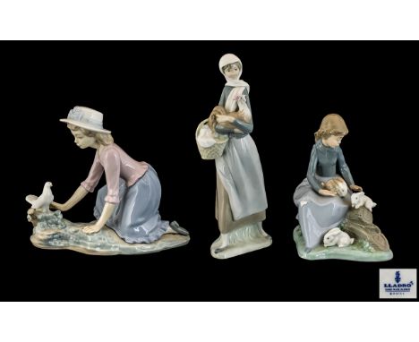 A Collection of Lladro and Nao Figures ( 3 ) In Total. Comprises 1/ ' Girl with Cockerel ' Model No 4591. Issued 1969 - 1993.