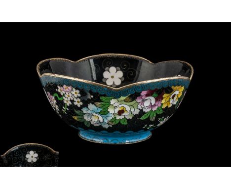 Chinese Cloisonne Shaped Bowl, decorated to the black enamel body with flowers and blossoms.  Marks to base.  Measures 5.5'' 
