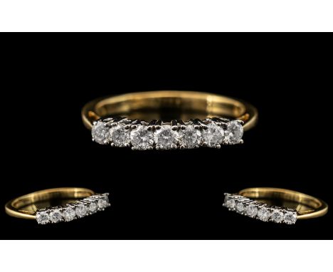 18ct Gold - Attractive Seven Stone Diamond Set Dress Ring. Fully Hallmarked for 750 - 18ct. The Seven Round Brilliant Cut Dia