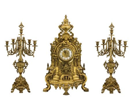 Large Italian Clock Garniture Of Baroque form Flanked by six-light candelabras, German Movement Marked For Franz Hermle, Stop