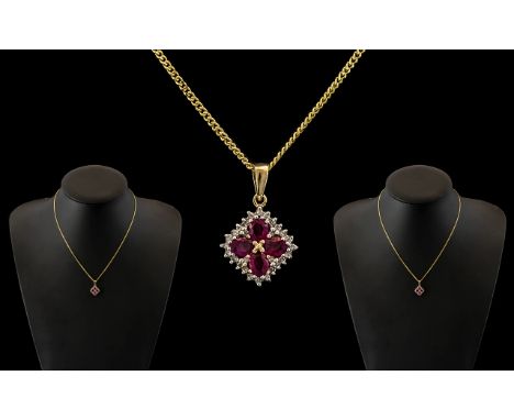9ct Gold Attractive Ruby and Diamond Set Pendant - Attached to a 9ct Gold Chain. Both Chain and Pendant Marked for 9ct. 3.4 g