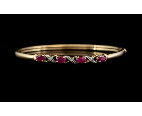 Ladies 9ct Gold Attractive Ruby and Diamond Set Hinged Bangle. Fully Hallmarked for 9ct. As New Condition In All Aspects - Pl