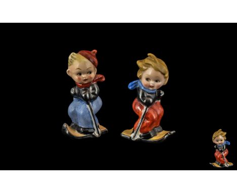 Goebel - Early and Scarce Hand Painted Boy and Girl Skiers Figural Salt and Pepper Shakers, Complete with Cork Stoppers. c.19