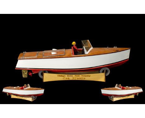 Model Boat marked Vintage Model boat company 'Sea Breeze' on plinth. Measures 24 inches. Motorboat with driver. 