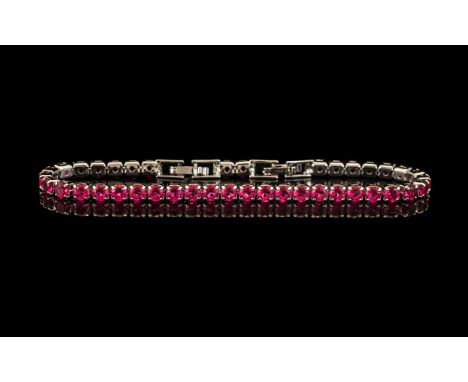 Ruby Style Tennis Bracelet, 40 Round Cut Ruby Style Stones Of Rich, Glowing Red, Closely Set In A Single Row Of Silver - Ruby
