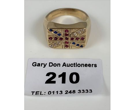 9k gold gents ring with red, white and blue stones in Union Jack flag design.  W: 9.69 gms. Size R