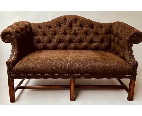 SOFA, George III style buttoned with scroll arms and channelled mahogany supports, 140cm W. 