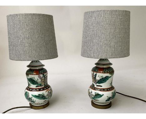 TABLE LAMPS, a pair, Chinese ceramic of gourd vase form with Chinoiserie figures decoration, with shades, 41cm H. (2) 