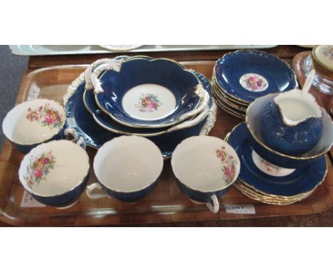 Tray of Coalport bone china tea ware decorated on a white and blue ground with floral sprays comprising cups, saucers, two ha