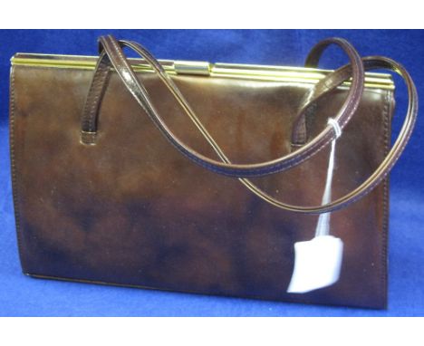 Maid Marion real leather brown ladies handbag.