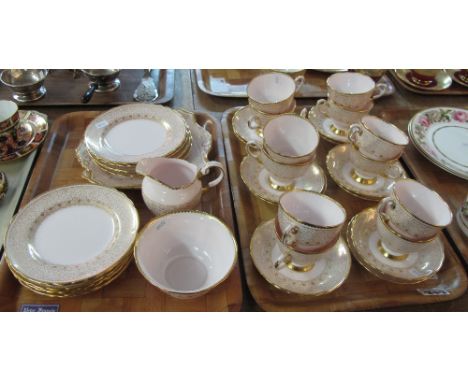 Two trays of Tuscan fine English bone china part tea ware items on a pink ground with gilt foliate decoration comprising: cup