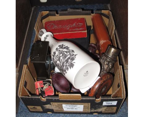Small tray of various oddments to include cast metal money box in the form of a man, Coalport china black and white decanter,