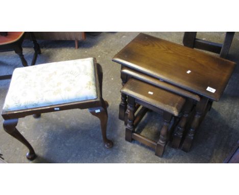 Reproduction oak nest of three tables together with an upholstered stool on cabriole legs. (2)