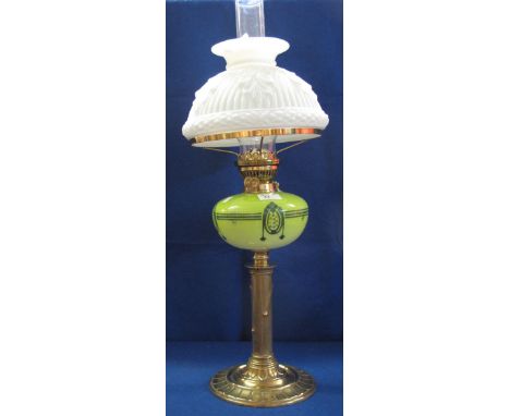Art Nouveau brass double oil lamp burner with green glass reservoir, cream acanthus leaf shade and clear glass funnel.