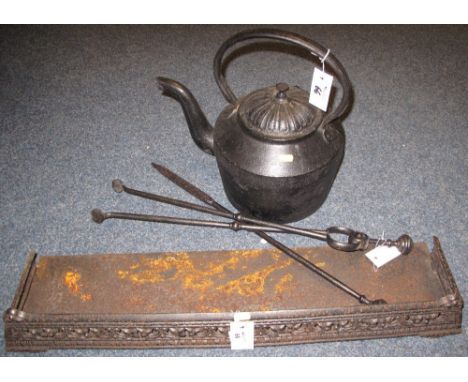Cast iron kettle and lid together with fire irons and fender.  (3)