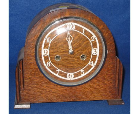 20th Century, oak cased, two train, arch shaped mantel clock.