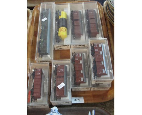 Tray of various Fleischmann HO carriages in original perspex cases to include 5206K, 5311K, 5471K, 5745K etc.  (9) 
