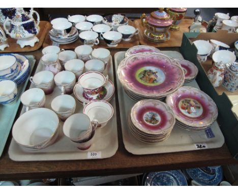 Two trays of assorted china to include continental part tea ware decorated with windmills and other buildings comprising cups