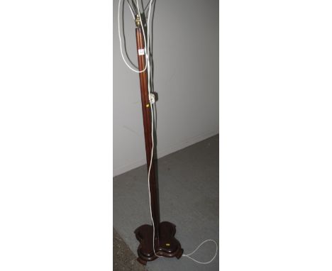 Modern mahogany standard lamp.