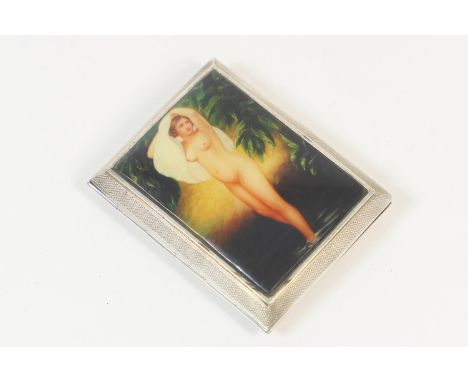 George V silver erotica cigarette case, Birmingham 1928, with engine turned decoration inset with an applied pictoral print o