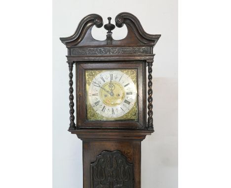 Andrew Knowles (Bolton, circa 1725-40), clockmaker, eight day carved oak longcase clock, the hood with barleytwist columns fl