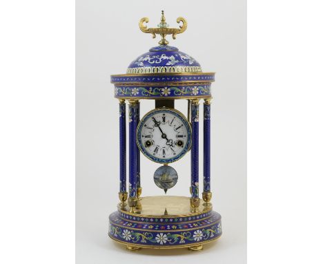 Decorative cloisonne mantel clock, temple form with a domed top supported on six pillars all in blue ground cloisonne with fl