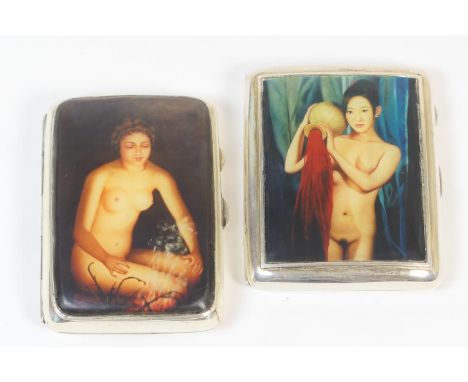 Two silver erotica cigarette cases, one of curved form with applied decoration of a nude seated by a fire, the reverse with t
